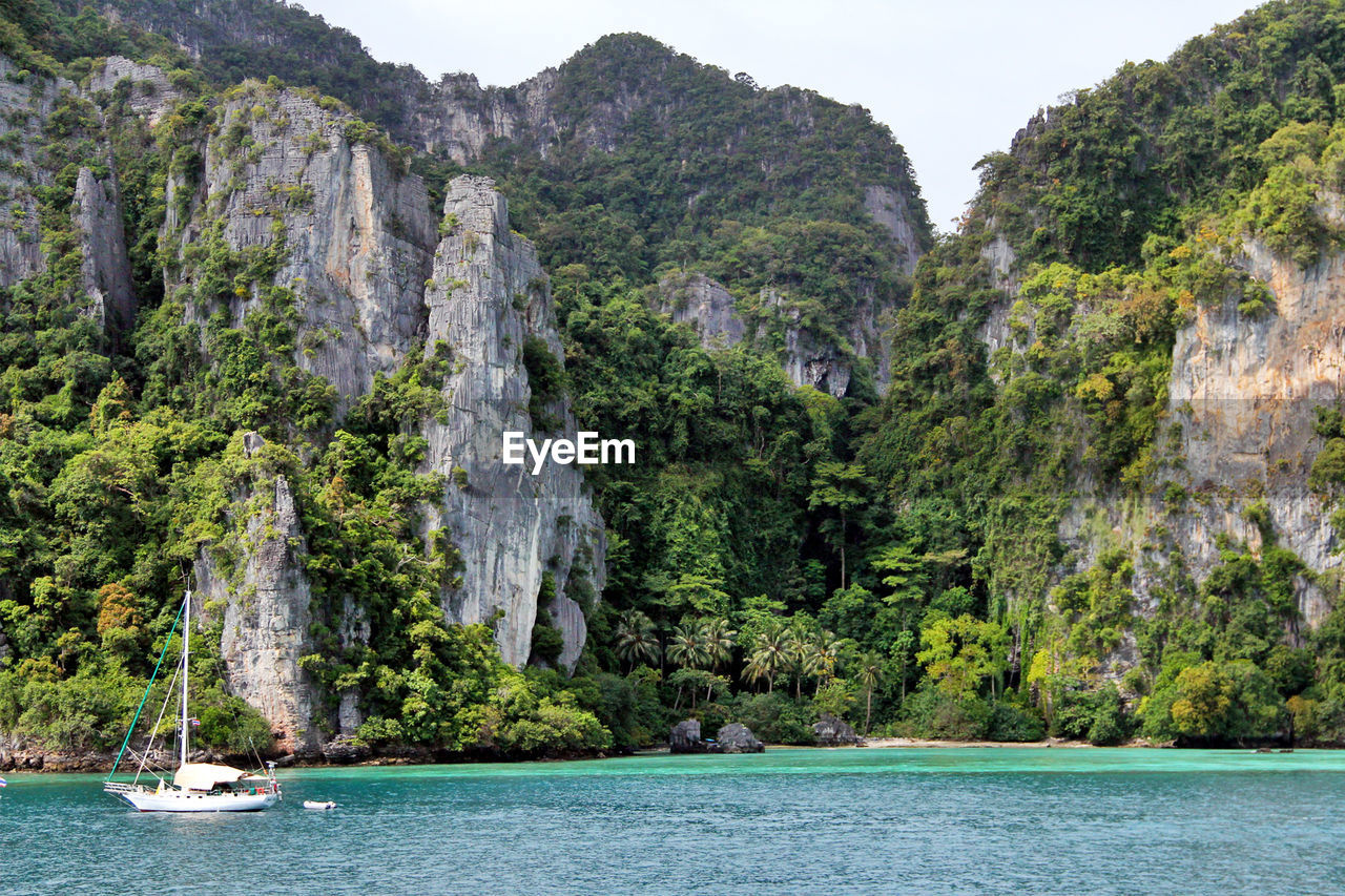 Scenic view of cliffs by the sea