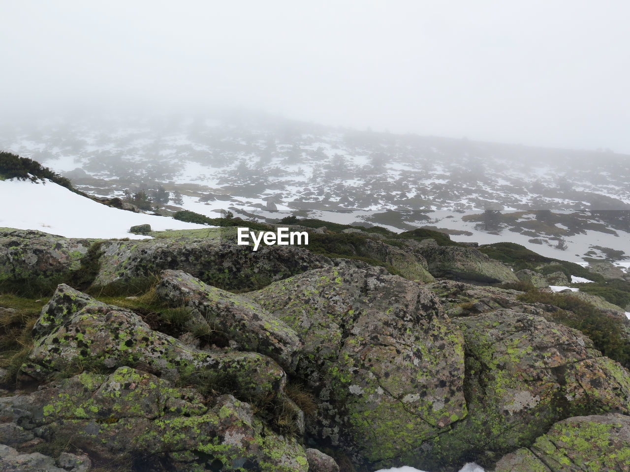 Scenic view of rocky mountains against sky