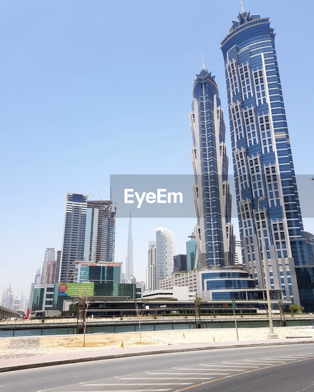 VIEW OF MODERN BUILDINGS AGAINST SKY