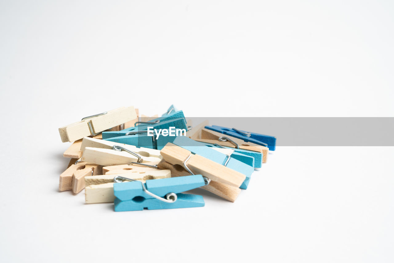 HIGH ANGLE VIEW OF TOYS ON WHITE BACKGROUND