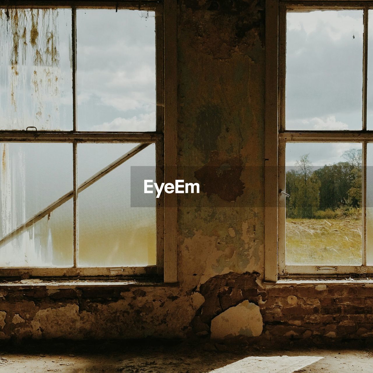 Window in old abandoned house