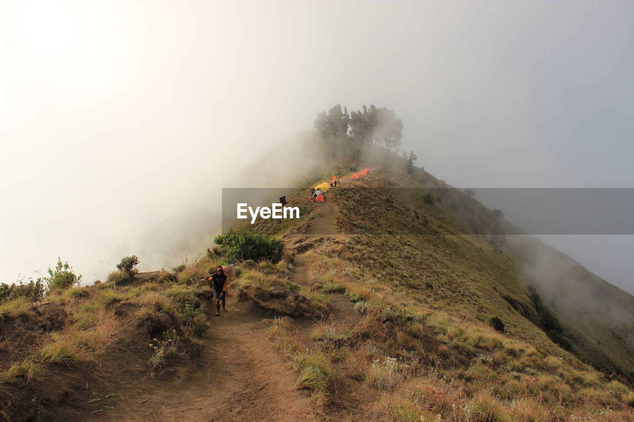 Scenic view of mountain in foggy weather