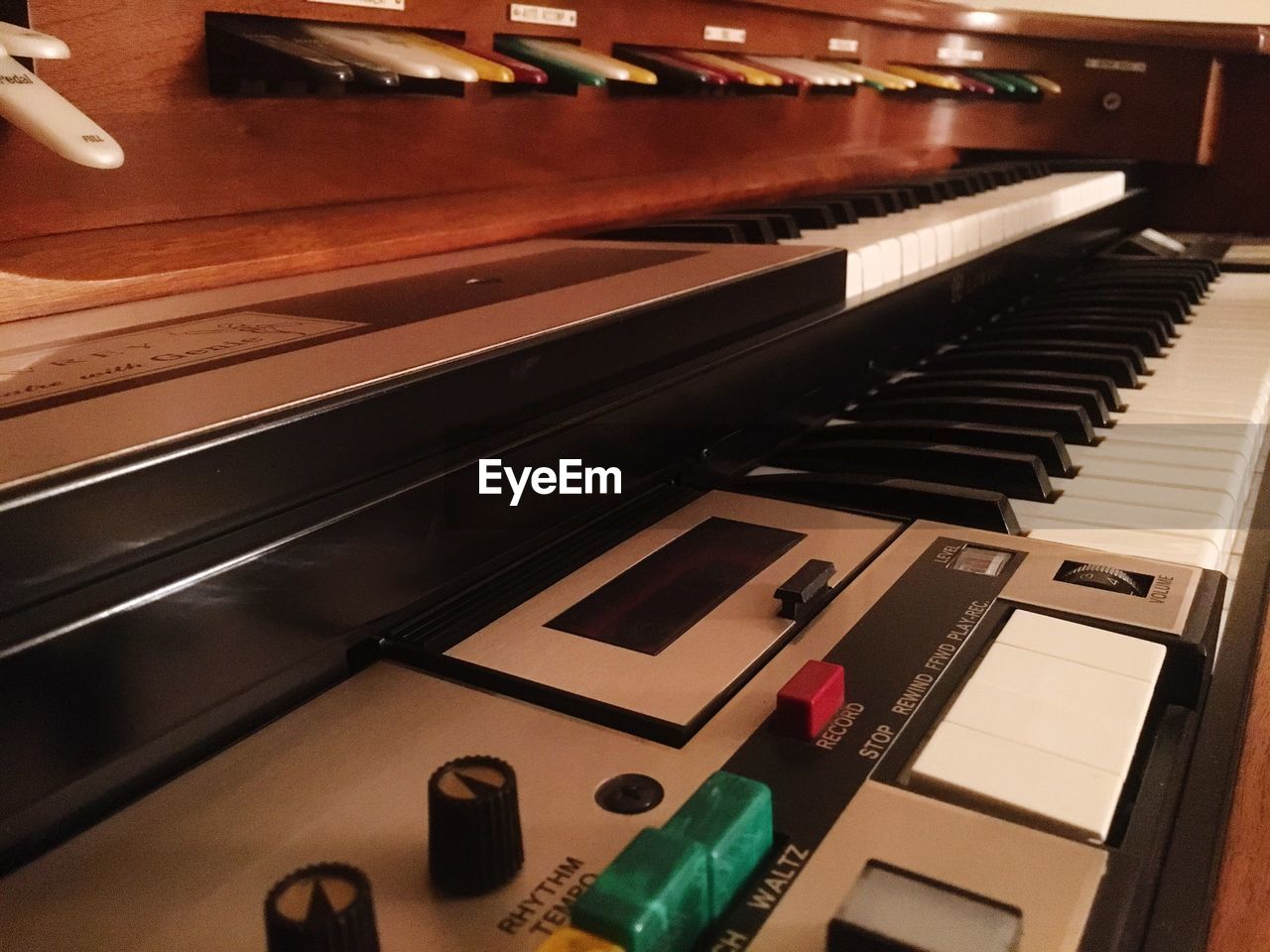 CLOSE-UP HIGH ANGLE VIEW OF PIANO