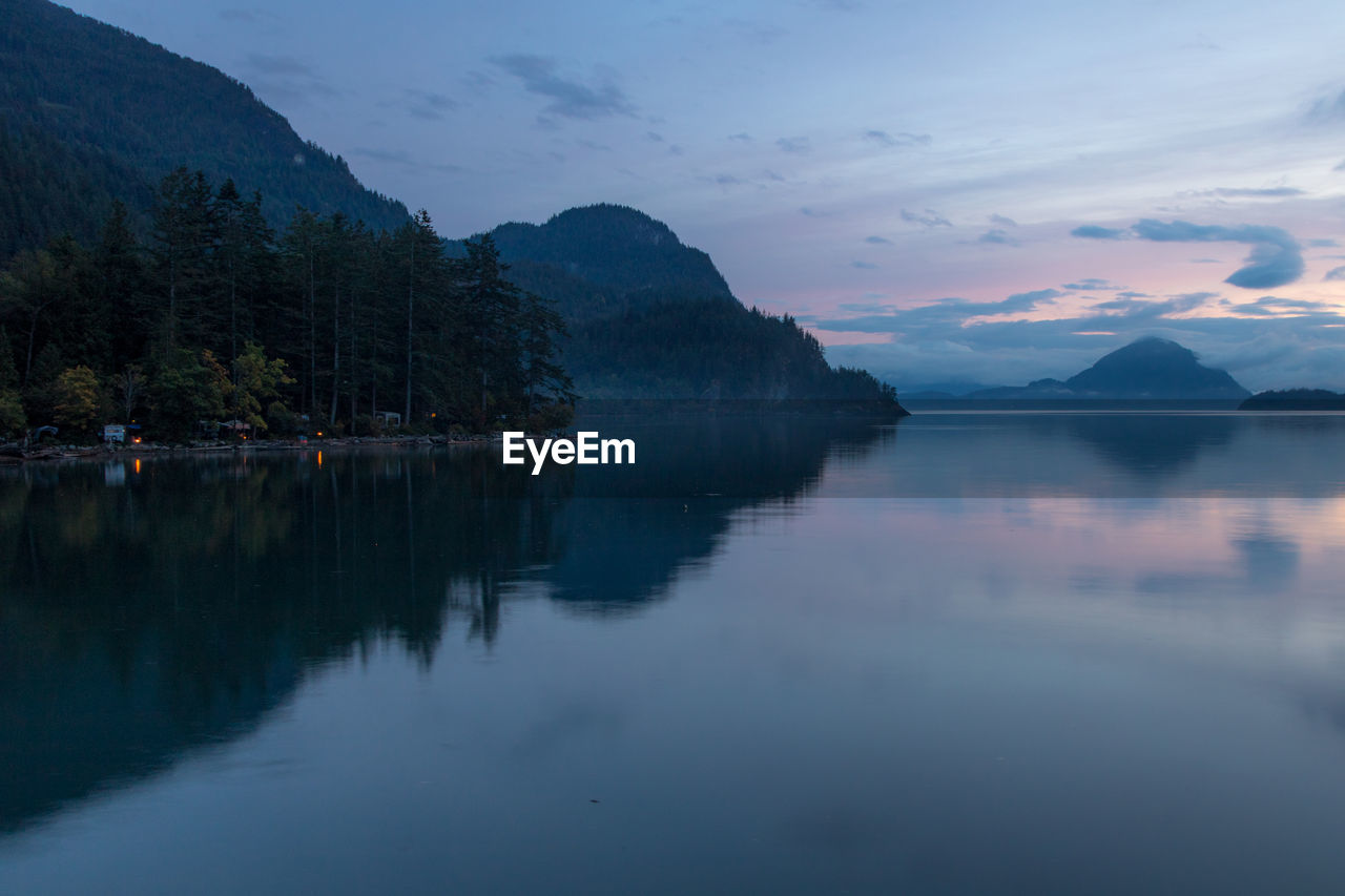 Scenic view of lake against sky during sunset