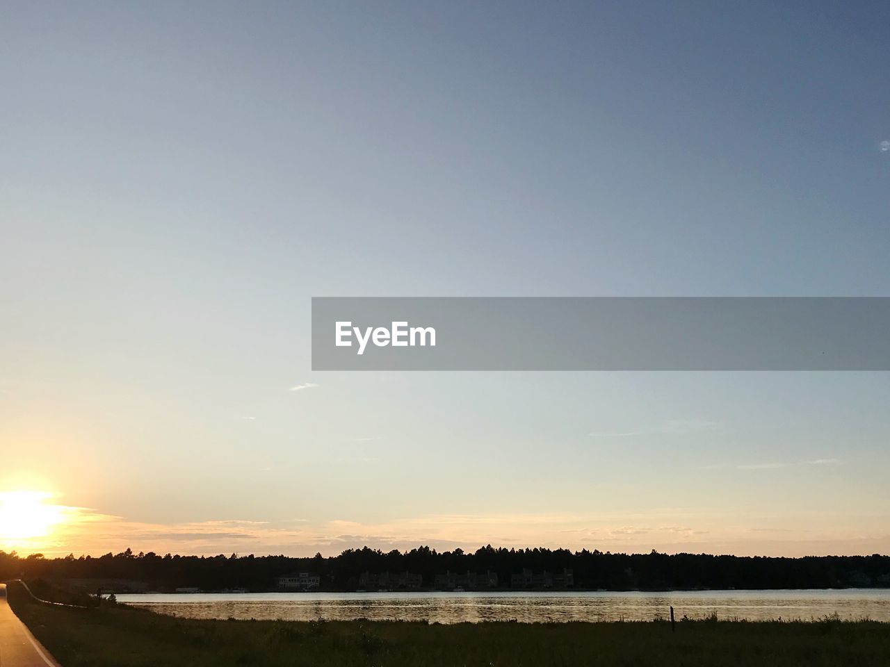 SILHOUETTE LANDSCAPE AGAINST SKY DURING SUNSET