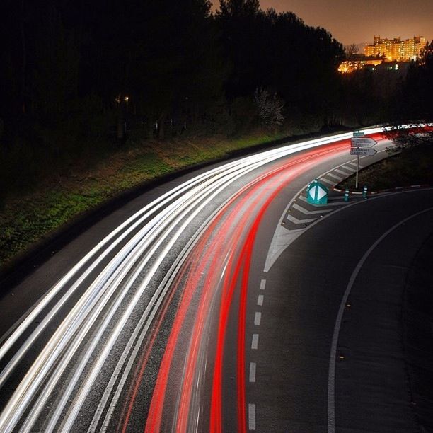 TRAFFIC ON ROAD AT NIGHT