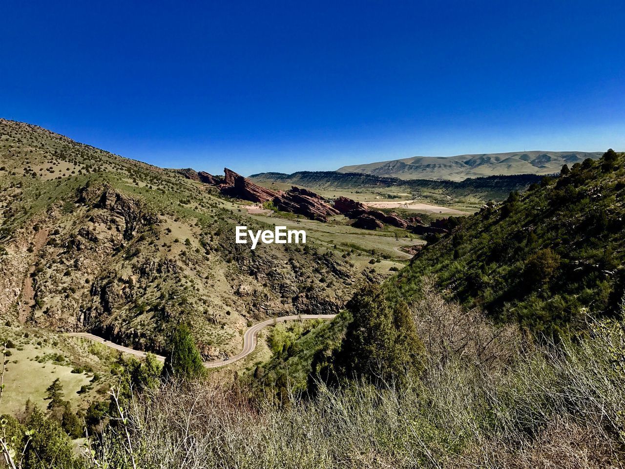 SCENIC VIEW OF MOUNTAINS AGAINST CLEAR BLUE SKY