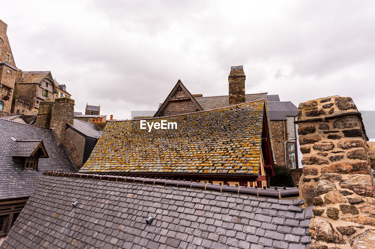 architecture, built structure, building exterior, roof, sky, building, cloud, history, roof tile, ancient history, the past, travel destinations, nature, city, wall, house, landmark, travel, no people, ruins, outdoors, brick, tourism, residential district, religion, industry, ancient, old, temple, construction industry, landscape, tradition, facade, business finance and industry