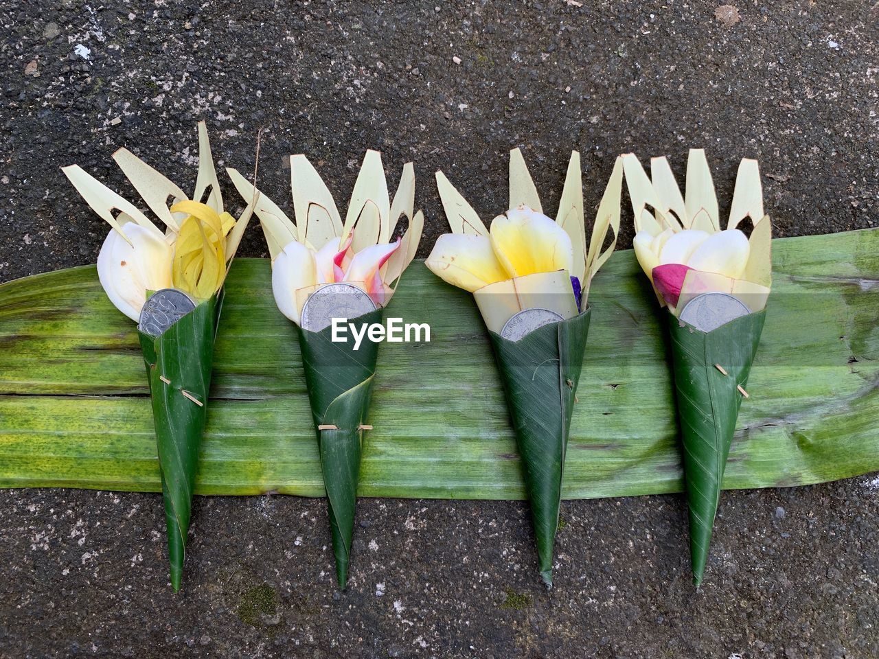 HIGH ANGLE VIEW OF MULTI COLORED UMBRELLAS