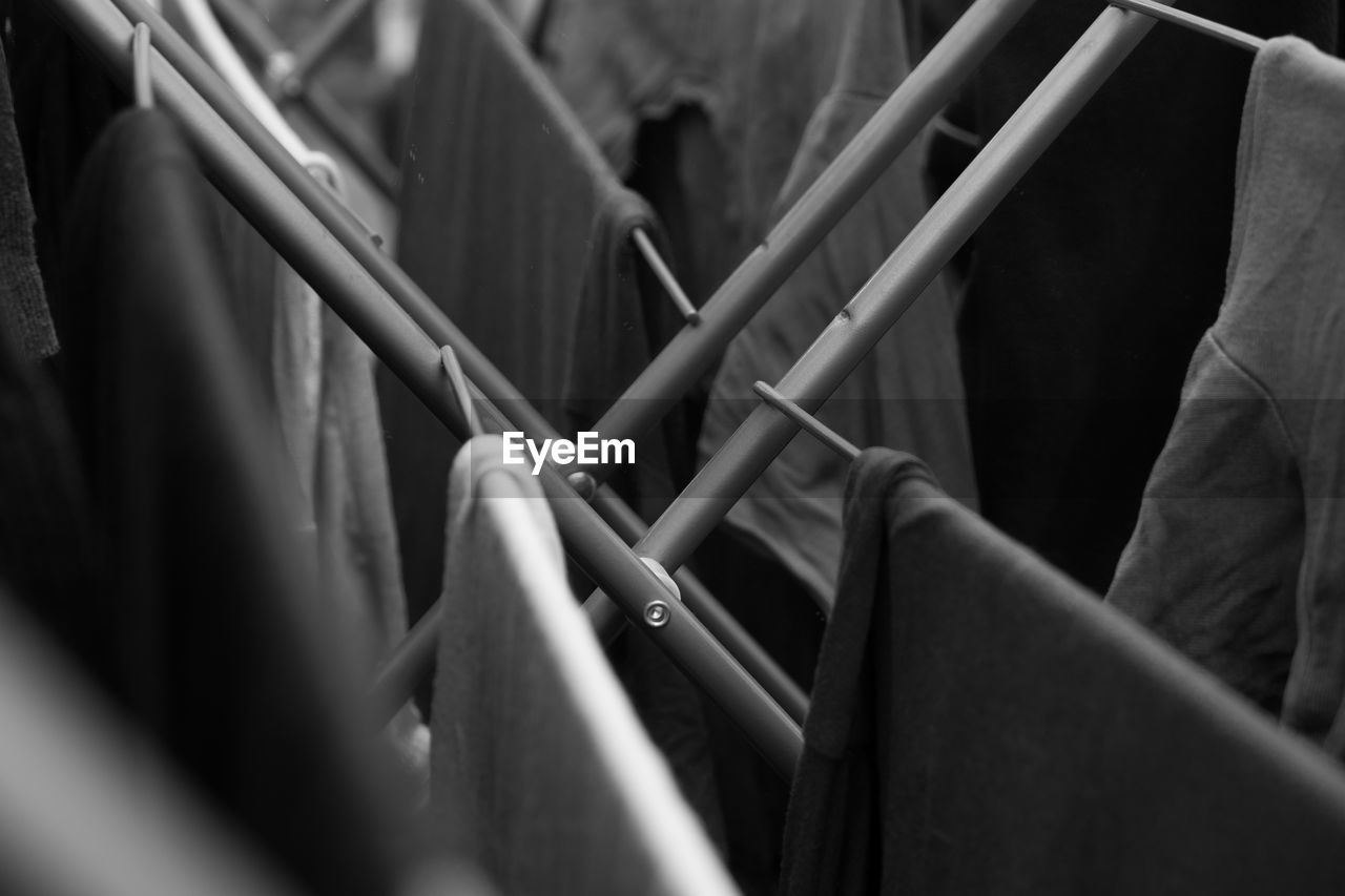 Close-up of clothes hanging on rack