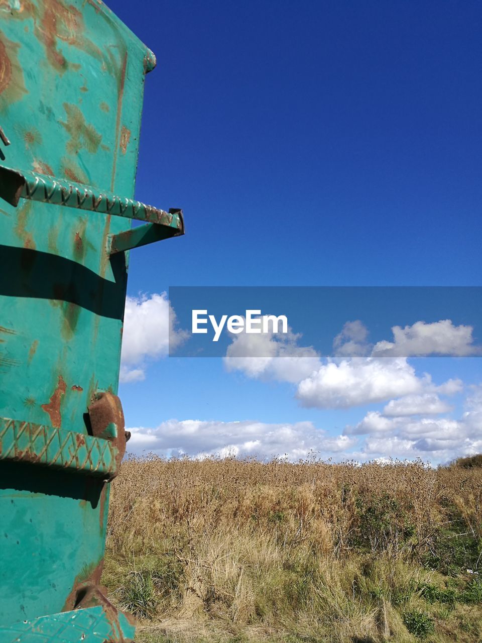 SURFACE LEVEL OF BLUE SKY WITH CLOUDS