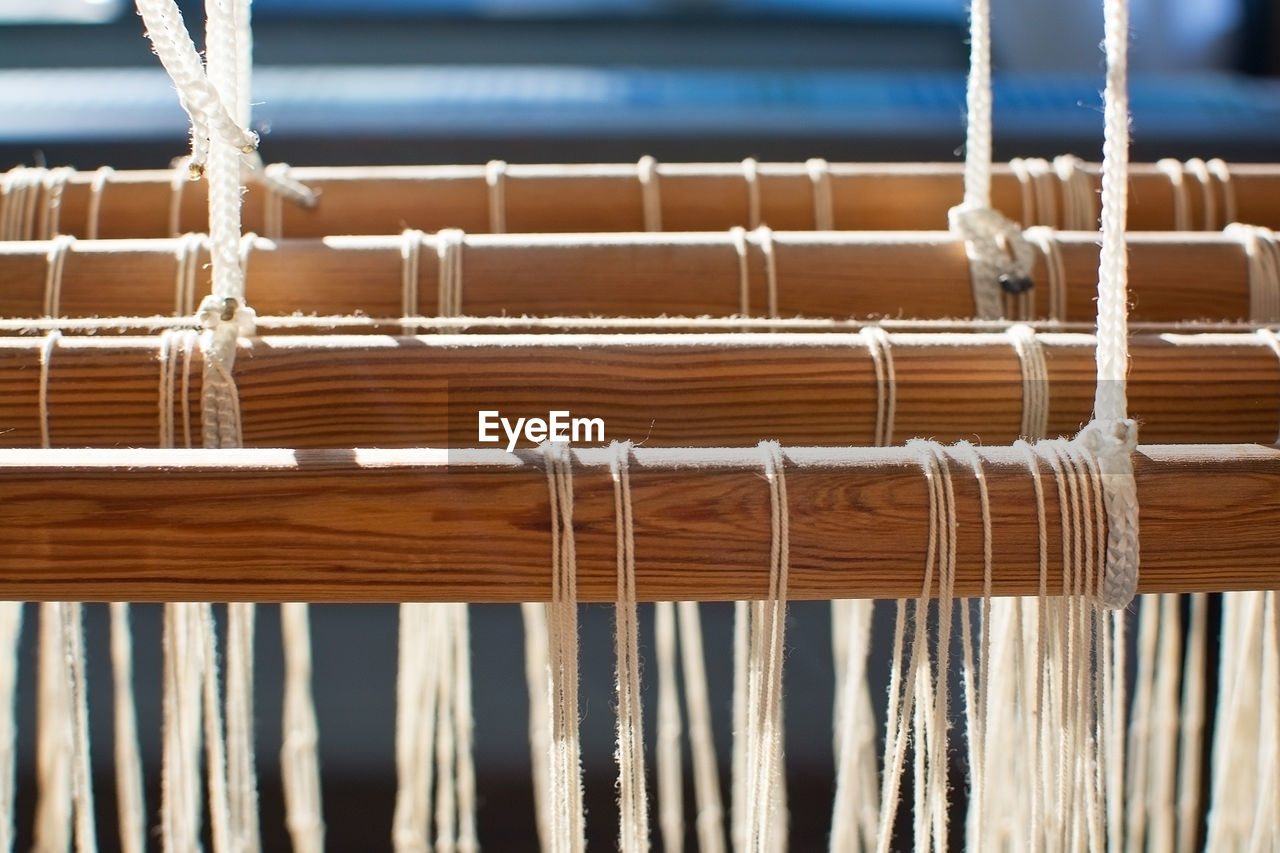 Close-up of hand loom in industry