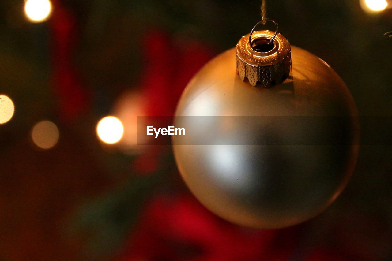 Close-up of bauble christmas tree at night