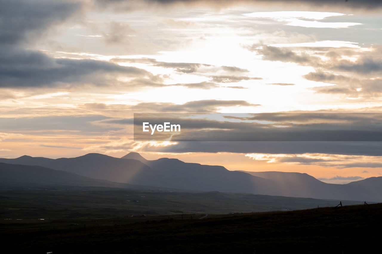 Scenic view of silhouette landscape against sky during sunset