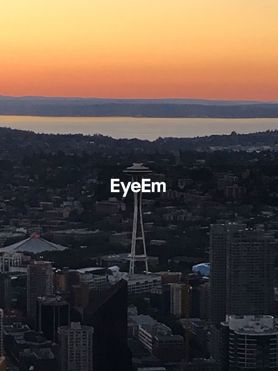 VIEW OF CITYSCAPE AT SUNSET