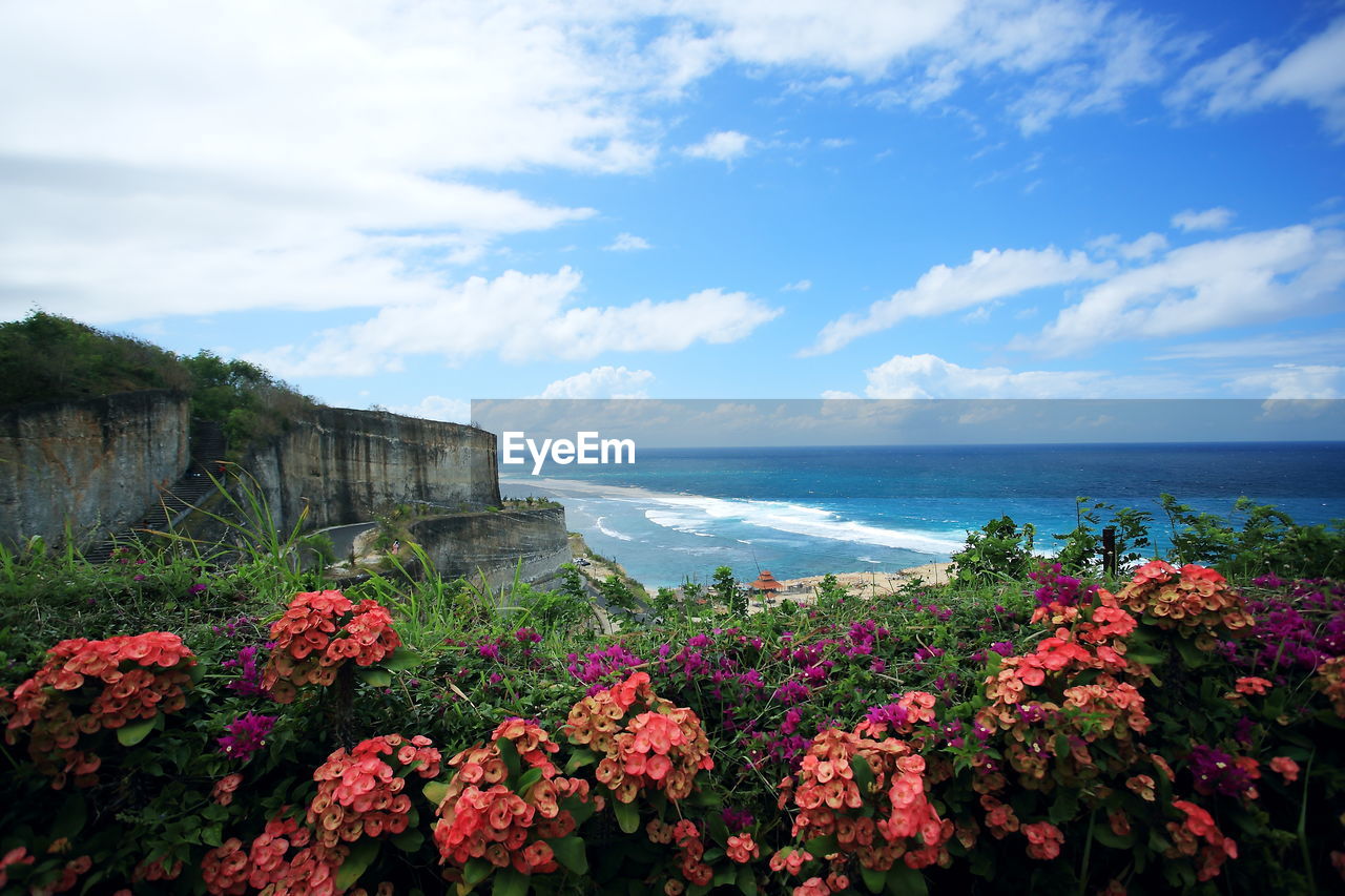 SCENIC VIEW OF SEA AGAINST SKY AT DUSK