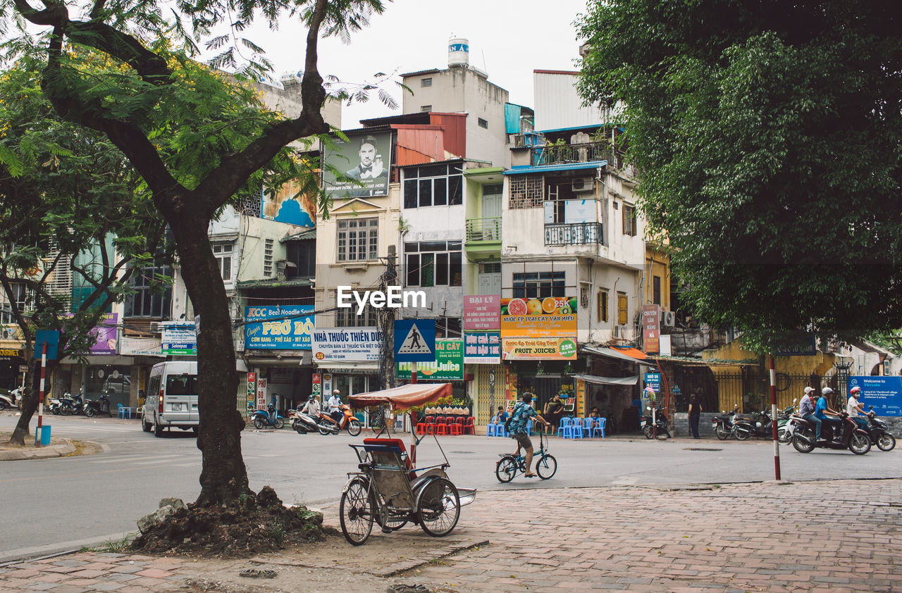 Buildings by street in city