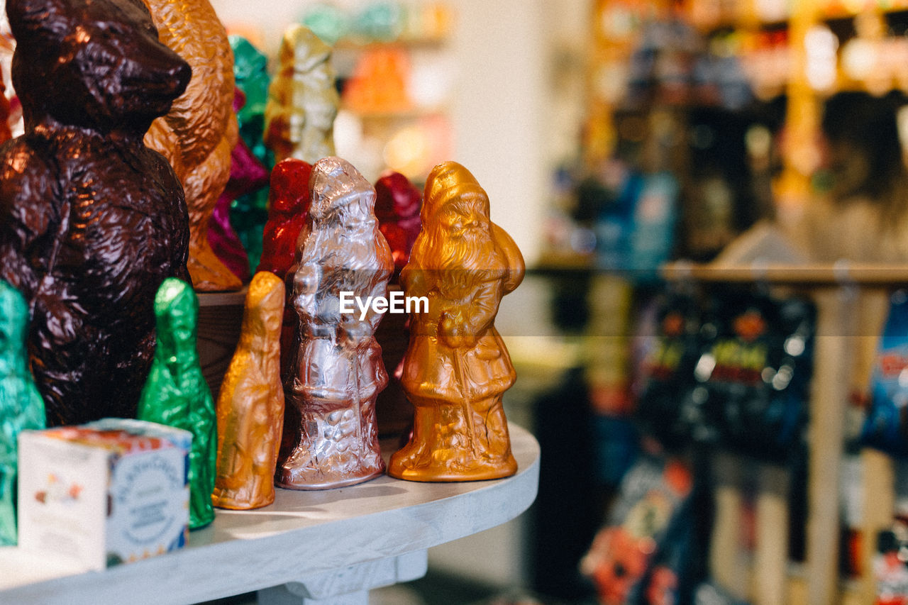 Close-up of colorful chocolate santa clause for sale