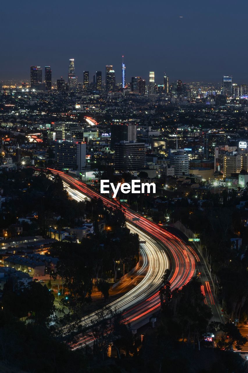 High angle view of illuminated city at night