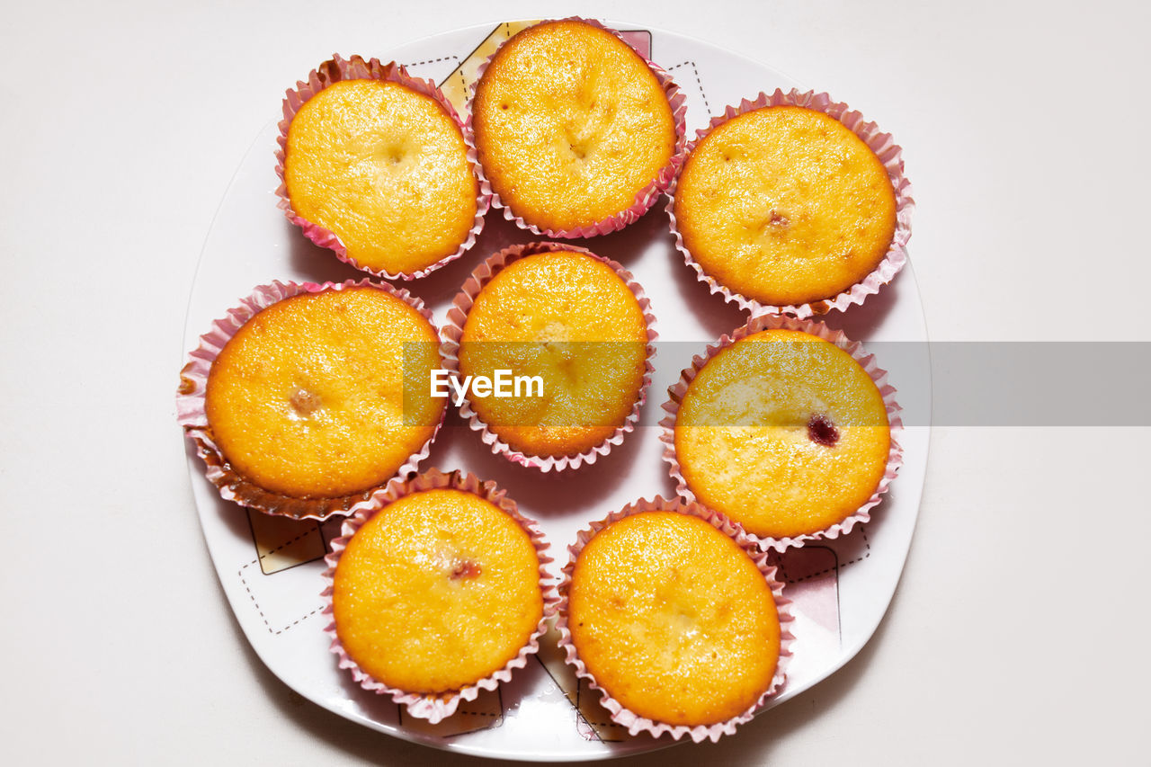 Cupcakes on the plate . homemade vanilla cakes