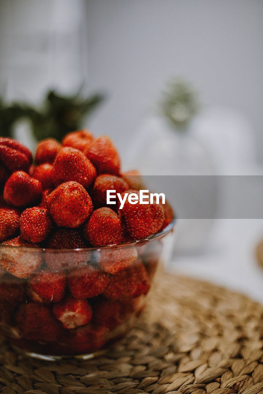 Close-up of strawberries in bowl on table