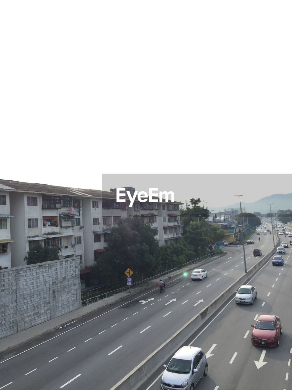 VIEW OF CARS ON STREET