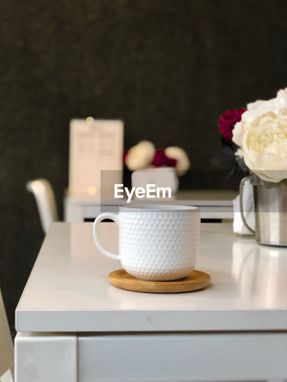 Close-up of coffee cup on table