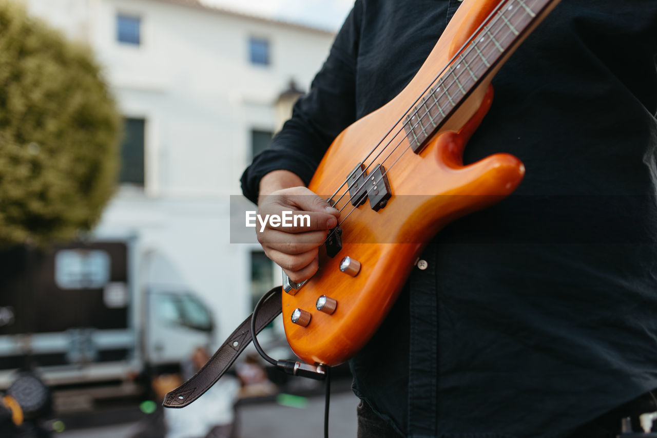 Man playing bass guitar