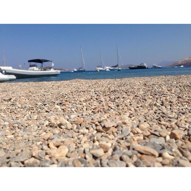 VIEW OF BOATS IN SEA