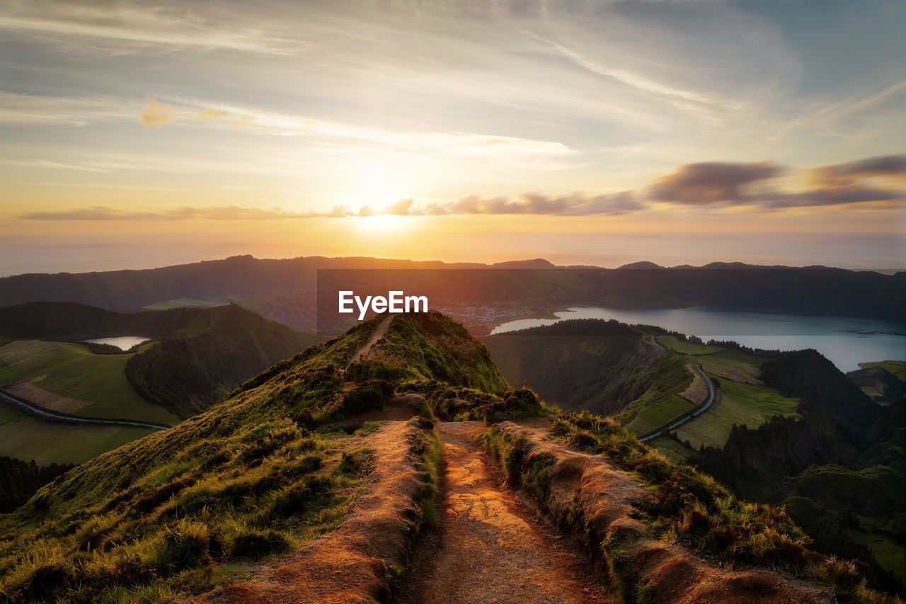 Scenic view of landscape against sky during sunset