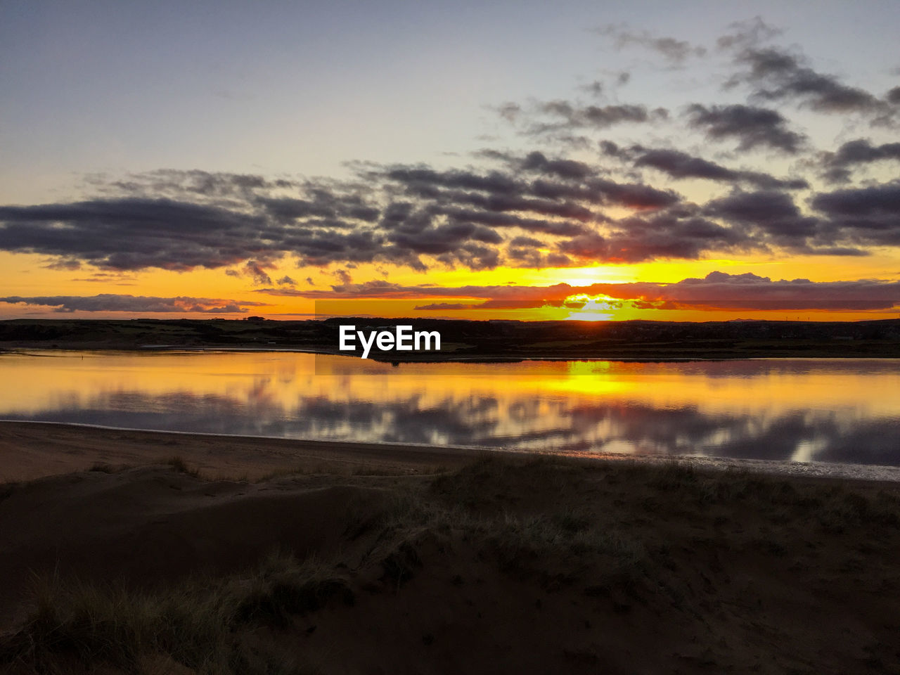 SUNSET OVER LAKE