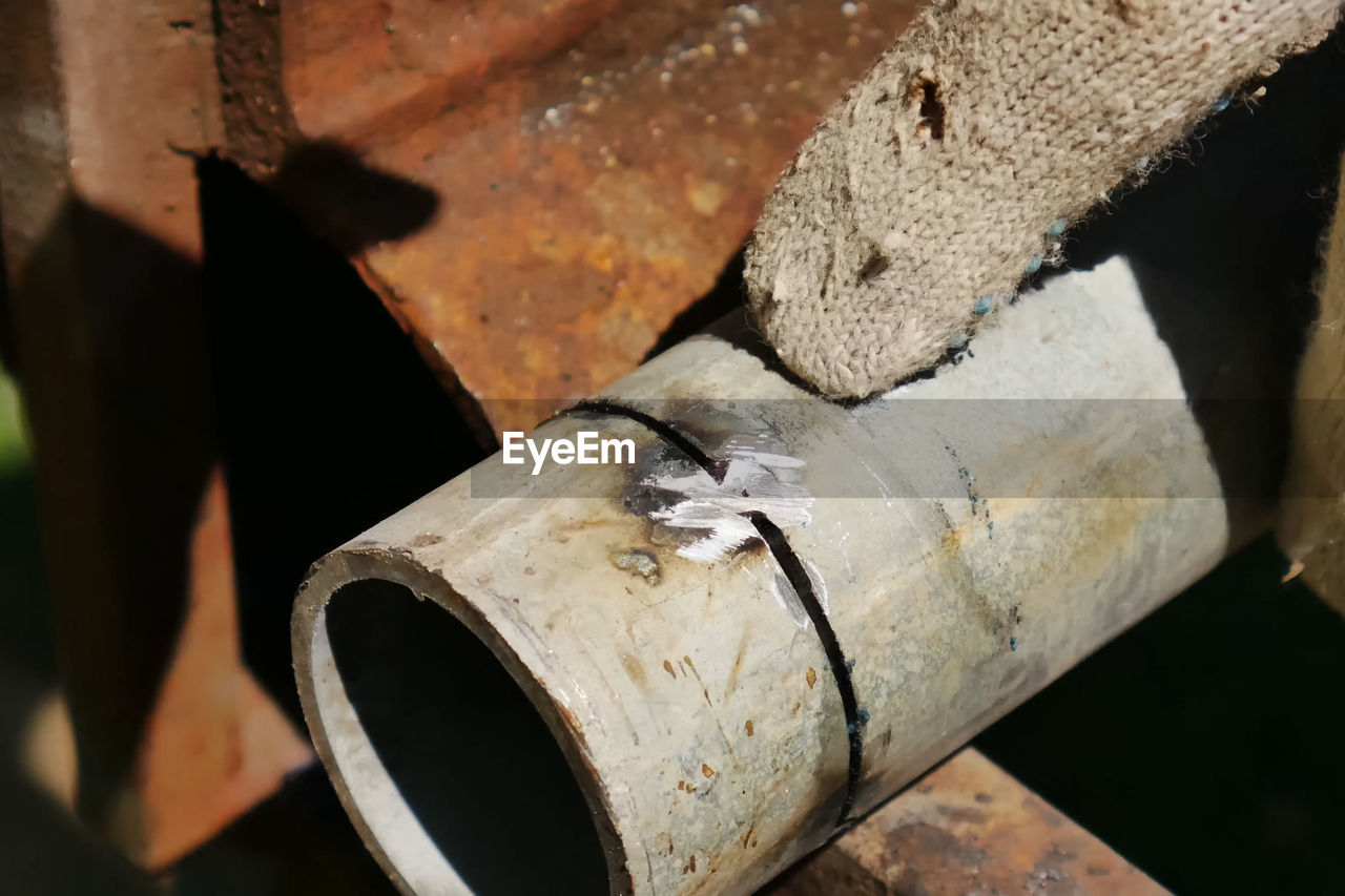 HIGH ANGLE VIEW OF RUSTY METAL