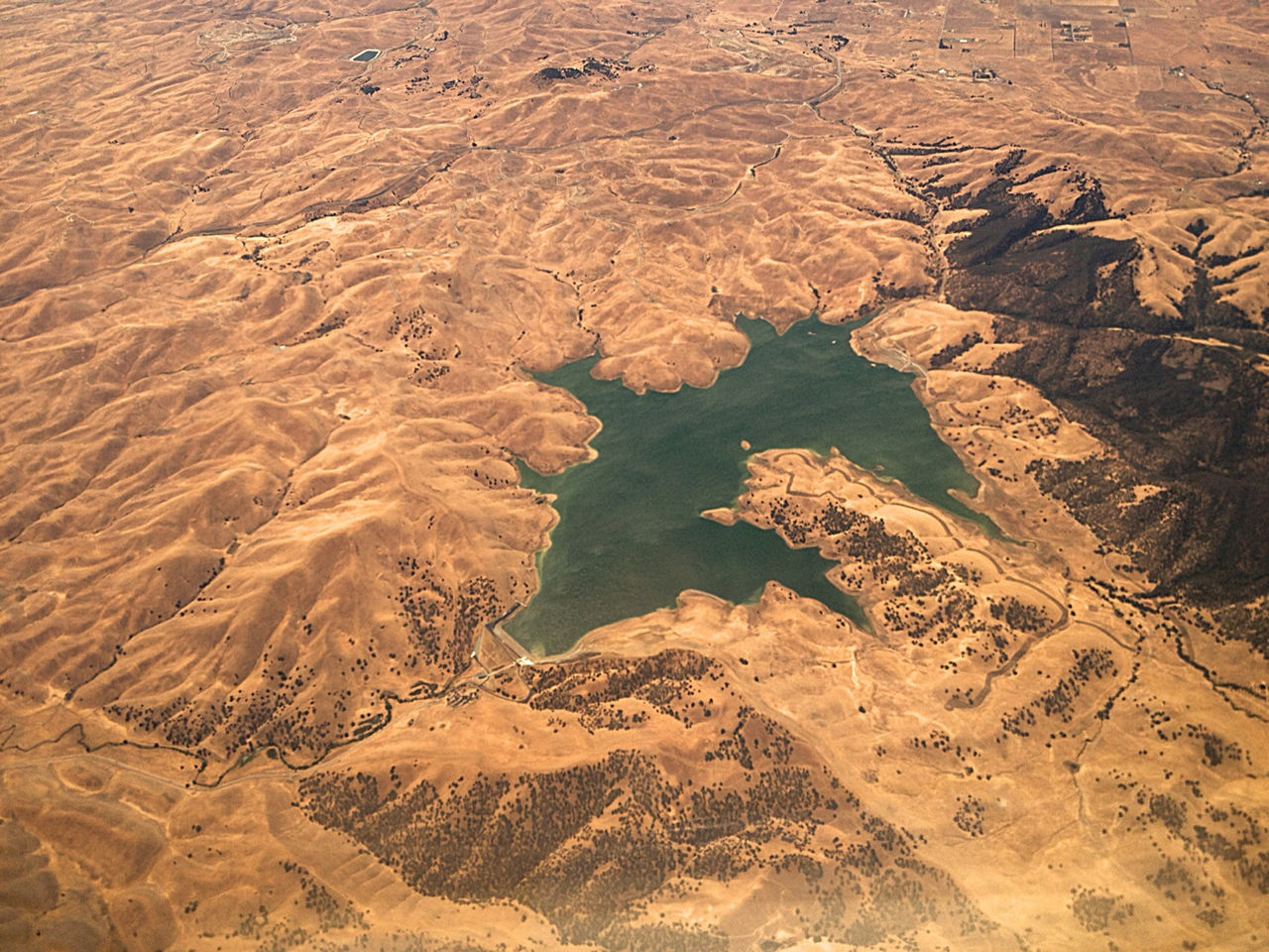 Aerial view of lake in rocky landscape