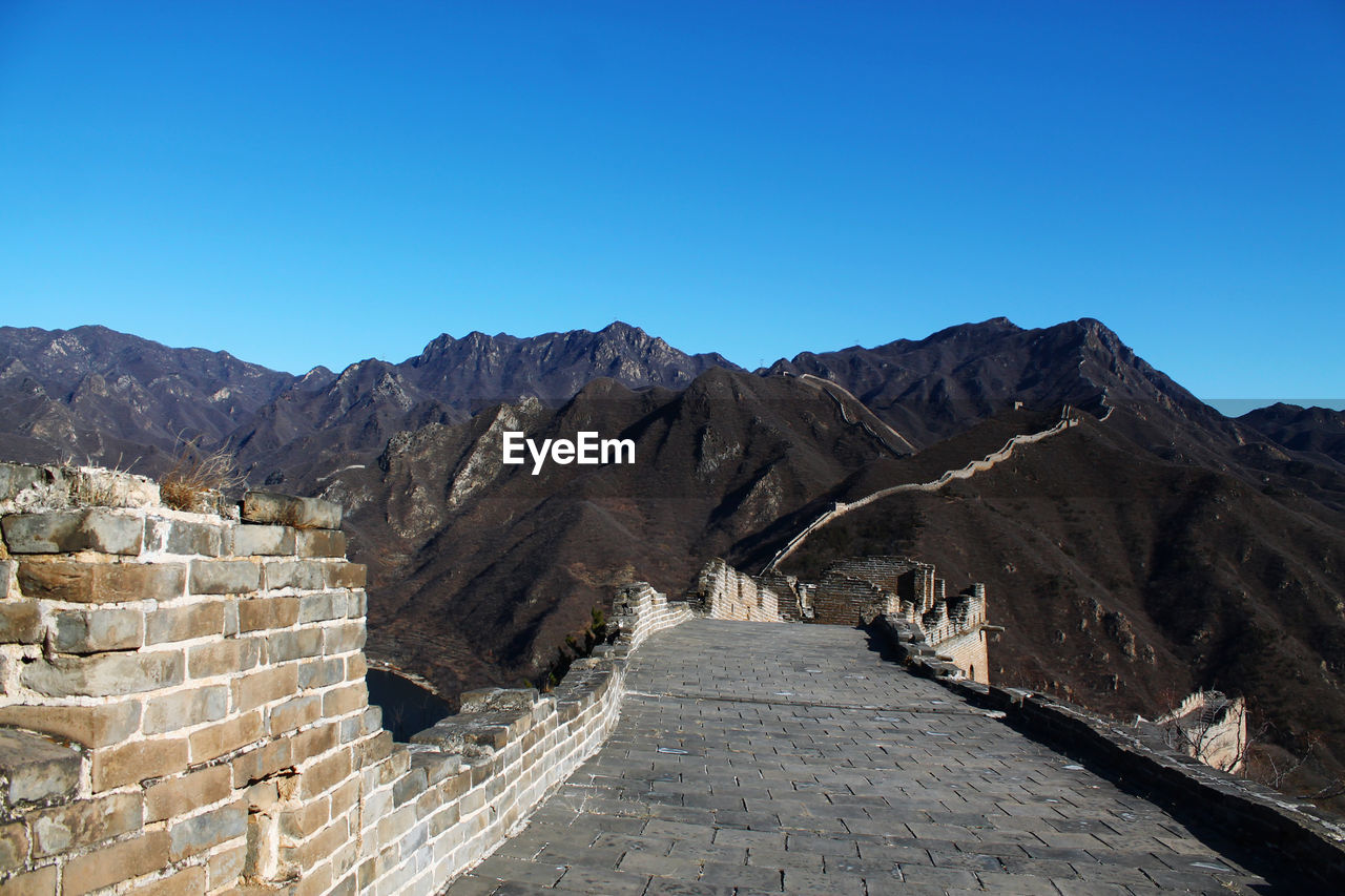 Scenic view of mountains by the great wall of china