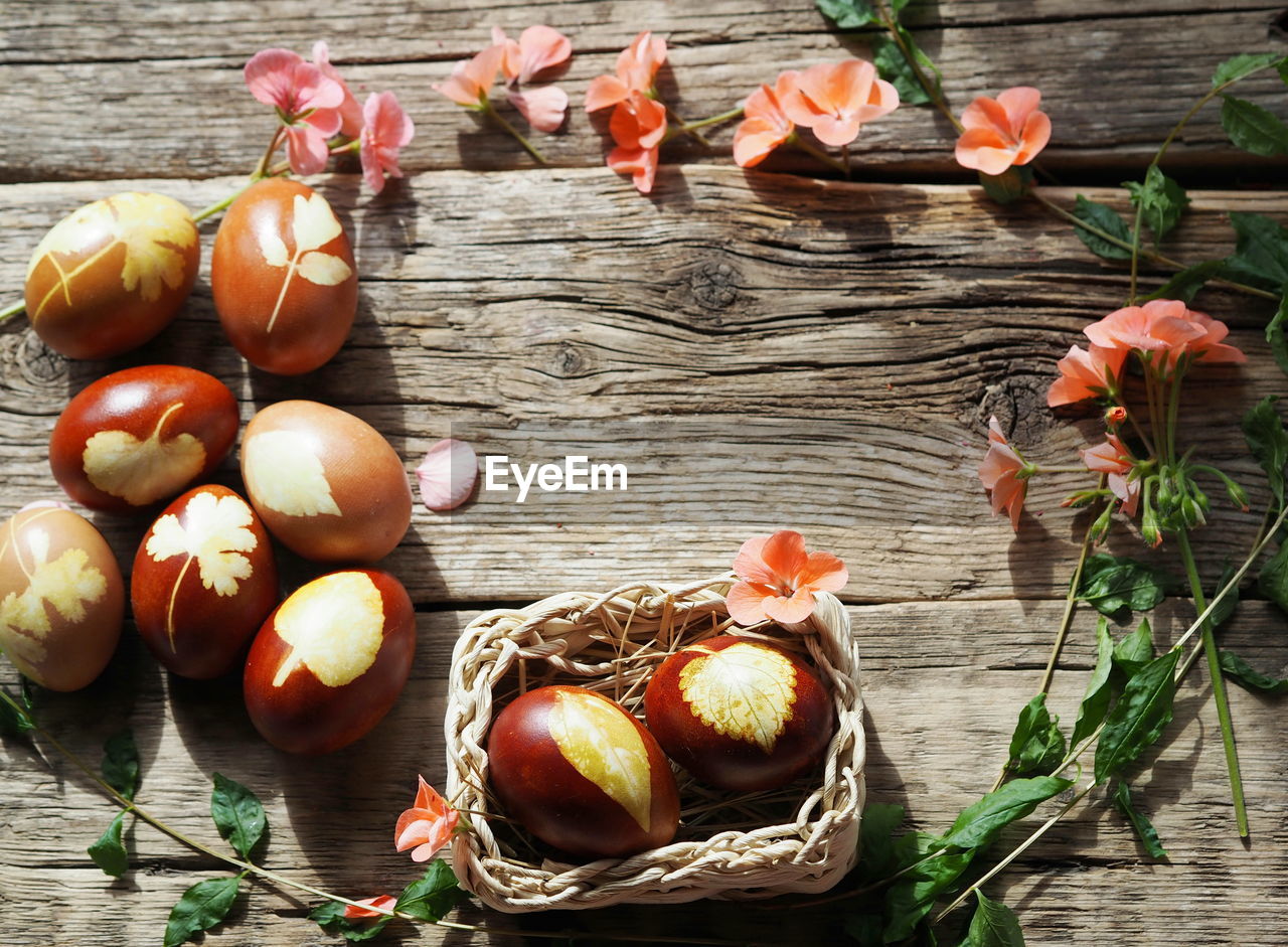food, food and drink, wood, freshness, healthy eating, basket, wellbeing, no people, nature, fruit, high angle view, container, table, still life, plant, day, vegetable, flower, outdoors, produce, wicker, egg, autumn