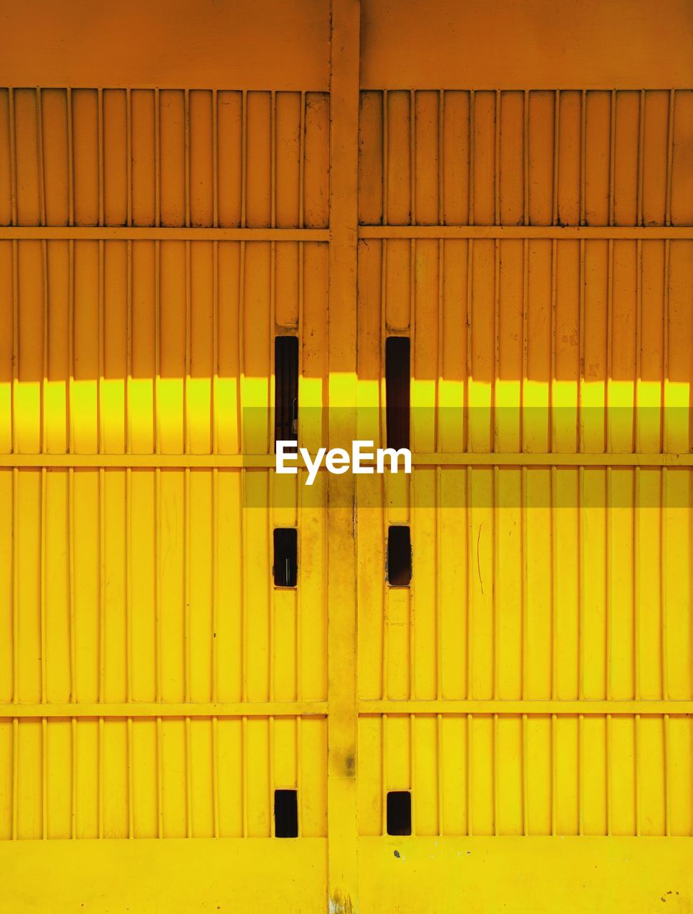 Full frame shot of yellow wall