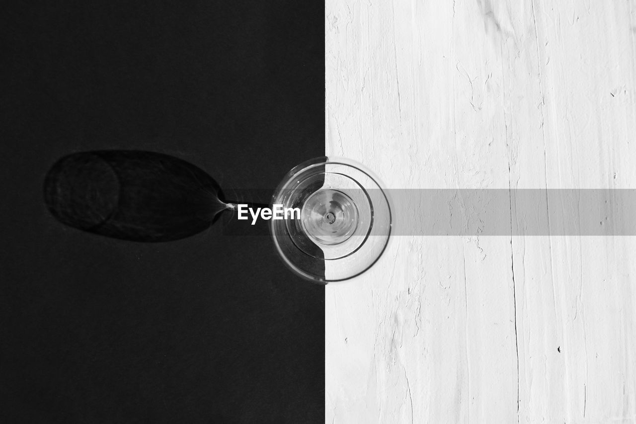 Top view of wine glass, black and white abstract concept