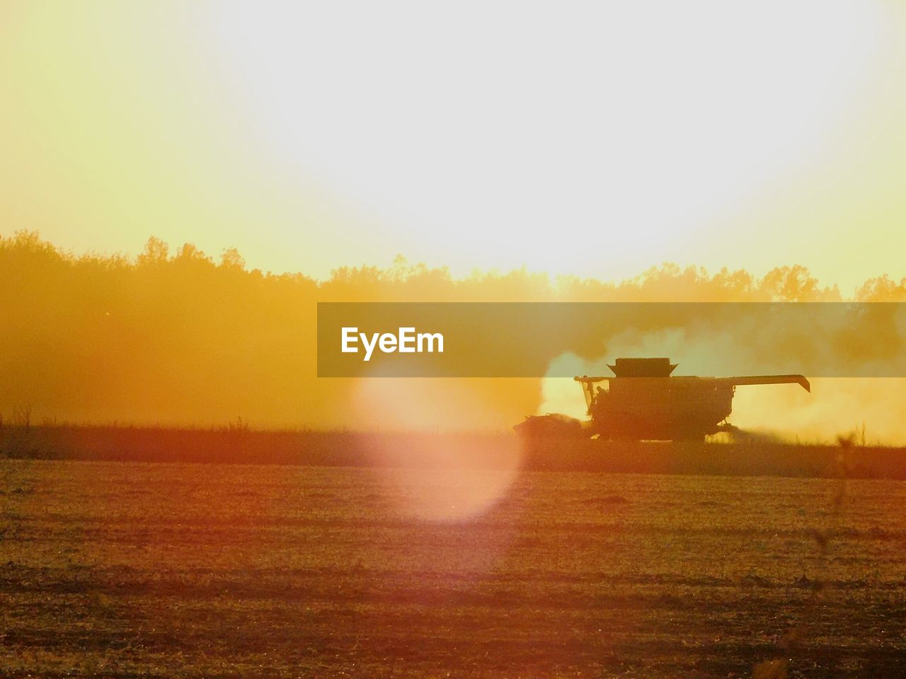 SCENIC VIEW OF FIELD AGAINST SKY DURING SUNSET