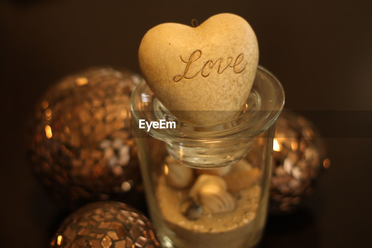 Close-up of heart shaped cookie in jar