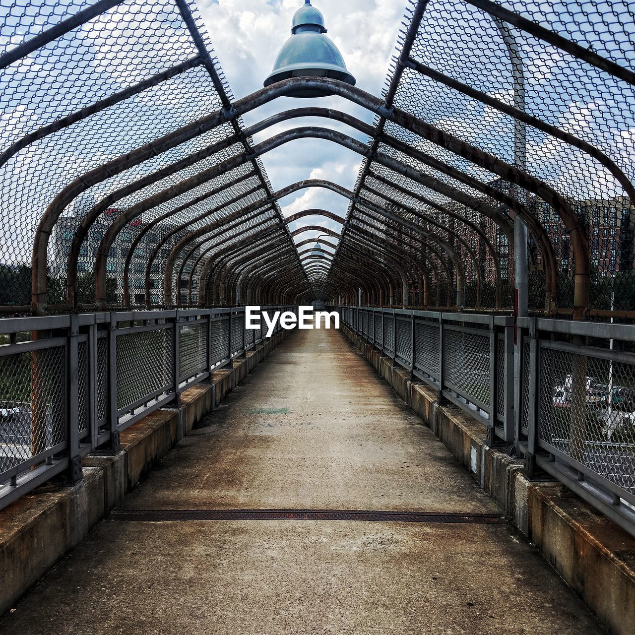 FOOTBRIDGE AMIDST BUILDINGS