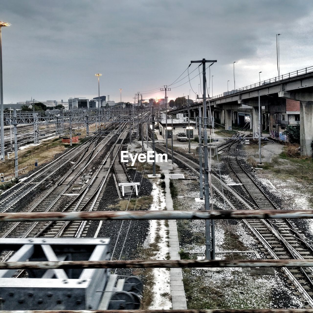 HIGH ANGLE VIEW OF RAILROAD TRACK AGAINST SKY