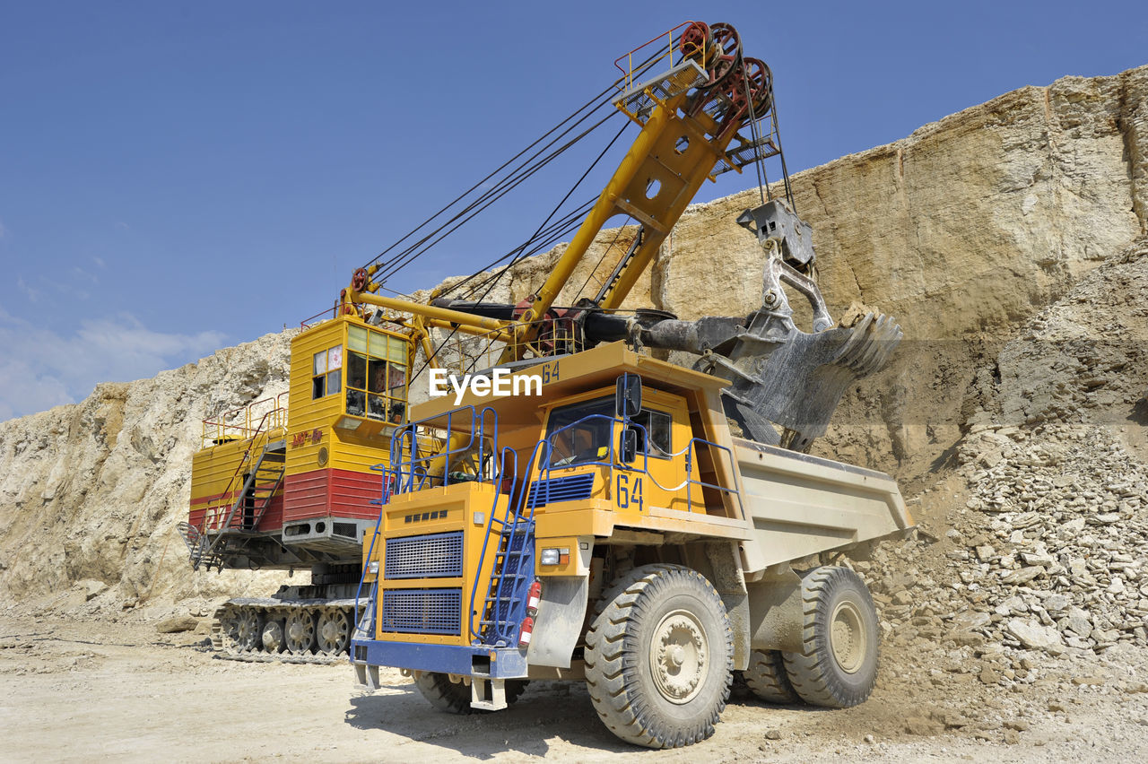 Earth mover working at quarry