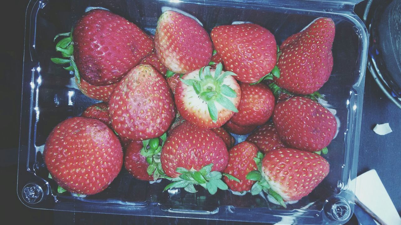 Close-up of strawberries in box