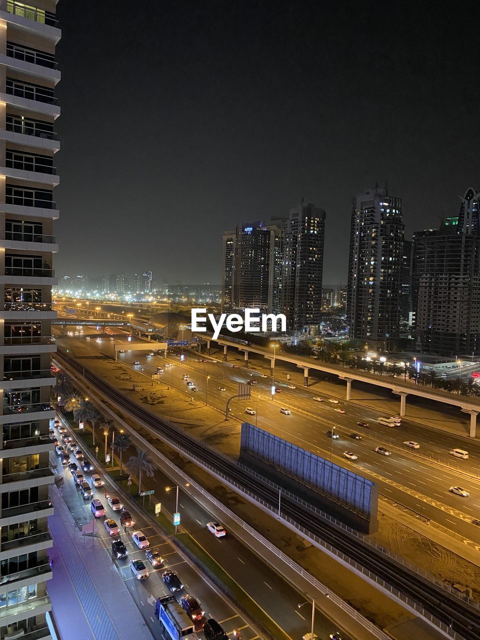 Illuminated buildings in city at night