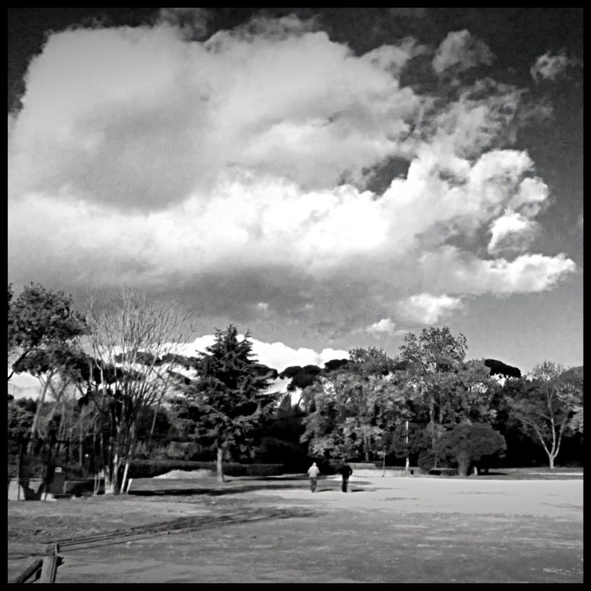 VIEW OF ROAD AGAINST CLOUDY SKY