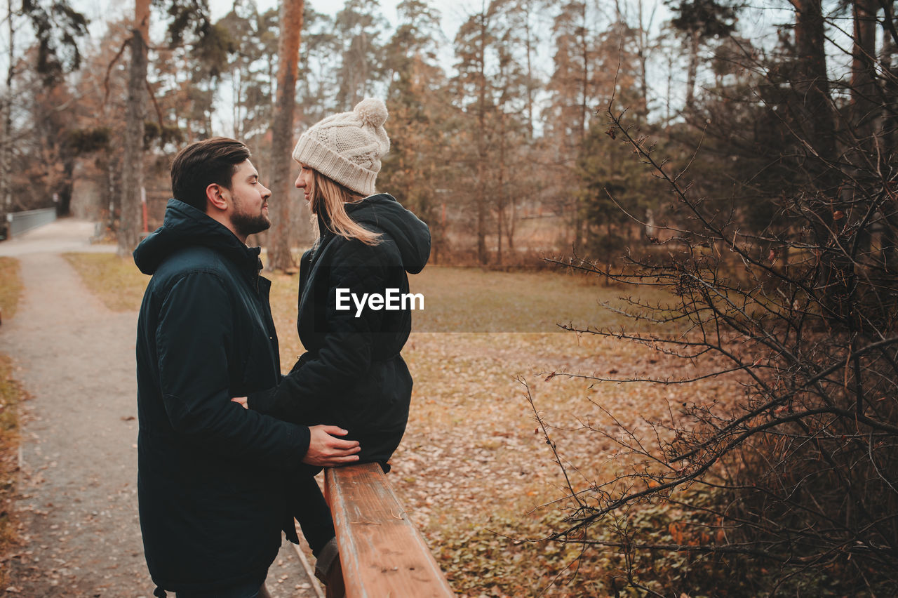 Romantic couple wearing warm clothing during winter