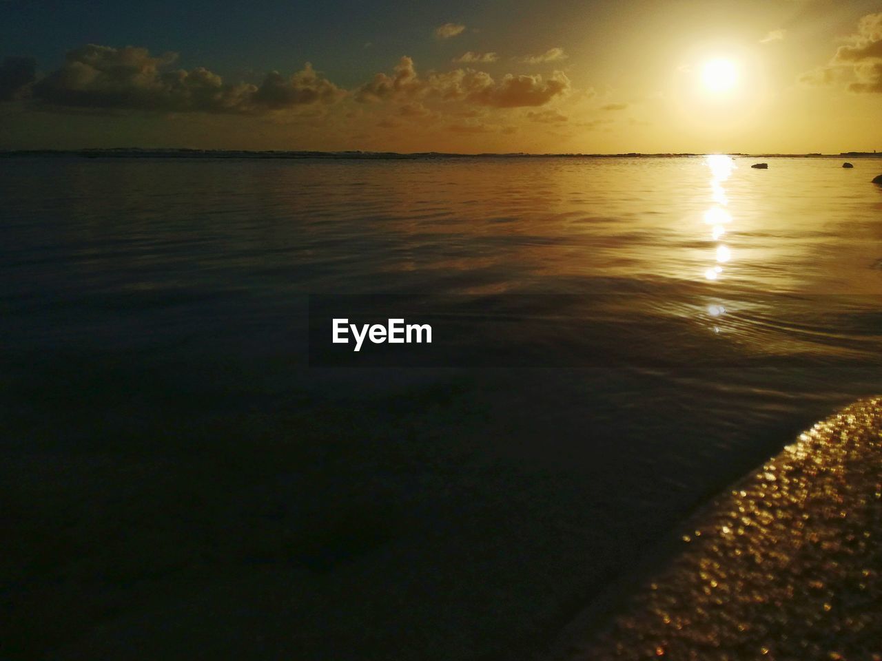 SCENIC VIEW OF SEA DURING SUNSET