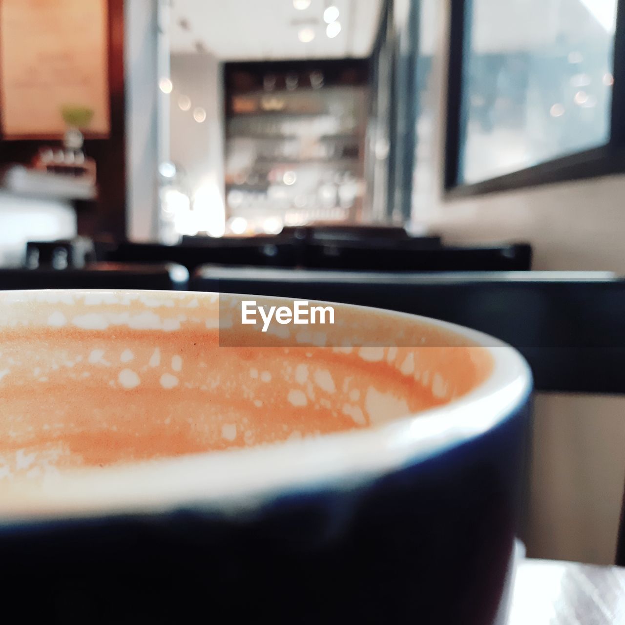 CLOSE-UP OF COFFEE ON TABLE