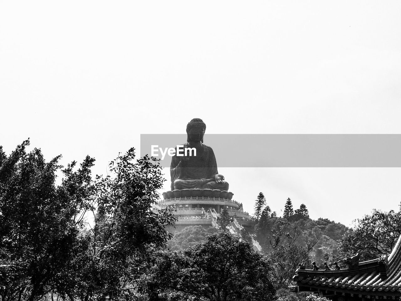 STATUE AGAINST CLEAR SKY