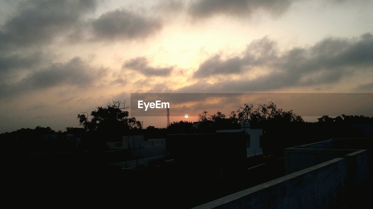 VIEW OF CLOUDY SKY OVER CITY